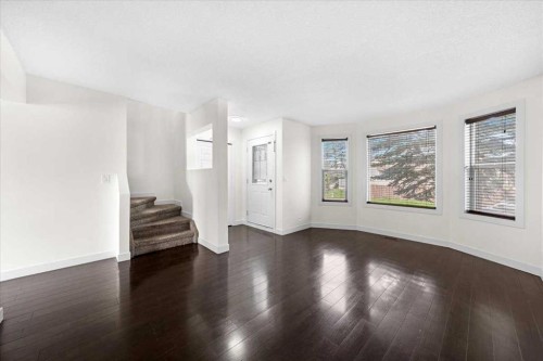 61 Falmere Way Ne, Calgary, AB - Indoor Photo Showing Other Room