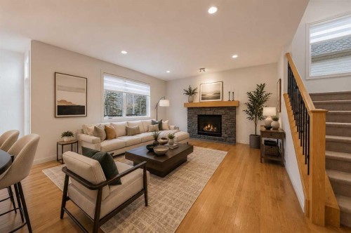 109 Silverado Creek Crescent Sw, Calgary, AB - Indoor Photo Showing Living Room With Fireplace