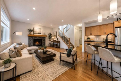 109 Silverado Creek Crescent Sw, Calgary, AB - Indoor Photo Showing Living Room With Fireplace