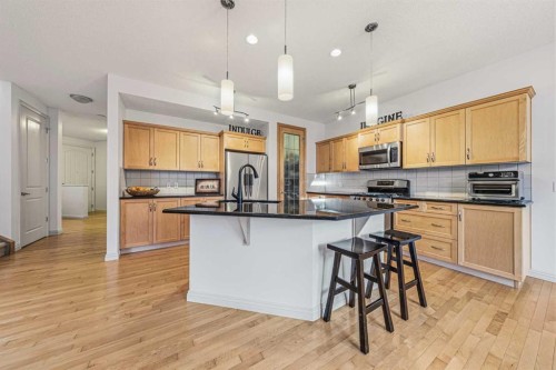 109 Silverado Creek Crescent Sw, Calgary, AB - Indoor Photo Showing Kitchen With Upgraded Kitchen