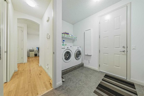 109 Silverado Creek Crescent Sw, Calgary, AB - Indoor Photo Showing Laundry Room