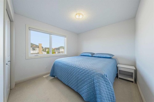 109 Silverado Creek Crescent Sw, Calgary, AB - Indoor Photo Showing Bedroom