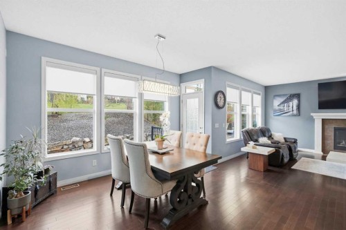 16 Sunset Terrace, Cochrane, AB - Indoor Photo Showing Other Room With Fireplace