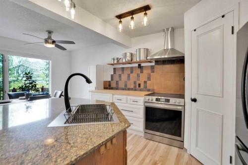 62 Macewan Park View Nw, Calgary, AB - Indoor Photo Showing Kitchen