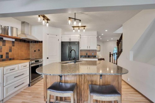 62 Macewan Park View Nw, Calgary, AB - Indoor Photo Showing Kitchen With Upgraded Kitchen