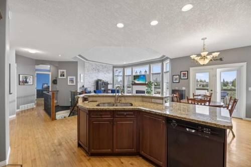 23 Lake Ridge, Olds, AB - Indoor Photo Showing Kitchen With Double Sink
