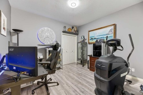 23 Lake Ridge, Olds, AB - Indoor Photo Showing Gym Room