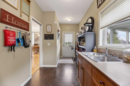 23 Lake Ridge, Olds, AB - Indoor Photo Showing Kitchen With Double Sink