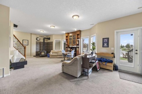 23 Lake Ridge, Olds, AB - Indoor With Fireplace