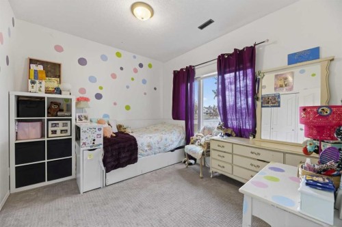 23 Lake Ridge, Olds, AB - Indoor Photo Showing Bedroom