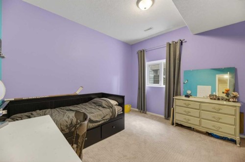 23 Lake Ridge, Olds, AB - Indoor Photo Showing Bedroom