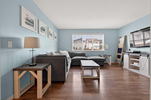 183 Copperpond Street Se, Calgary, AB - Indoor Photo Showing Living Room