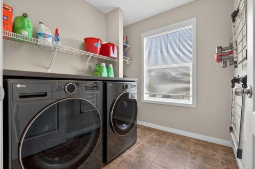 183 Copperpond Street Se, Calgary, AB - Indoor Photo Showing Laundry Room