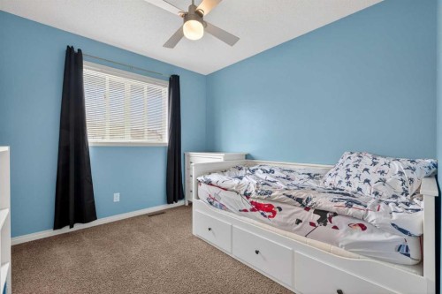 183 Copperpond Street Se, Calgary, AB - Indoor Photo Showing Bedroom