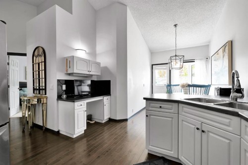9 Chaparral Villas Se, Calgary, AB - Indoor Photo Showing Kitchen With Double Sink