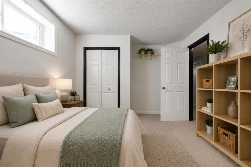9 Chaparral Villas Se, Calgary, AB - Indoor Photo Showing Bedroom