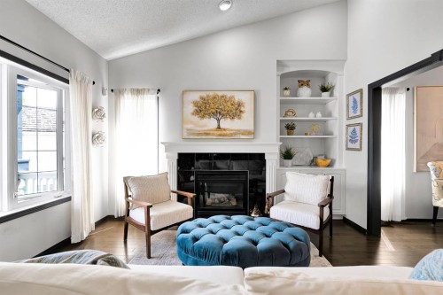 9 Chaparral Villas Se, Calgary, AB - Indoor Photo Showing Living Room With Fireplace