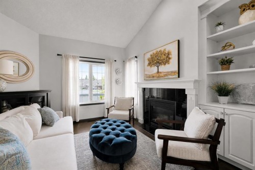 9 Chaparral Villas Se, Calgary, AB - Indoor Photo Showing Living Room With Fireplace