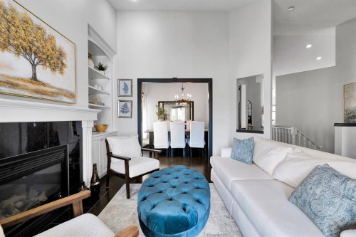 9 Chaparral Villas Se, Calgary, AB - Indoor Photo Showing Living Room With Fireplace