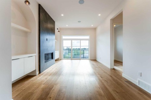 90 Hartford Road Nw, Calgary, AB - Indoor With Fireplace
