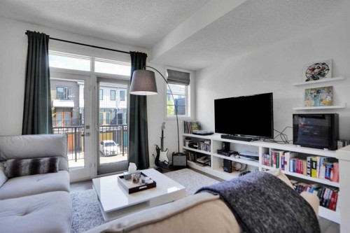 281 Walden Drive Se, Calgary, AB - Indoor Photo Showing Living Room