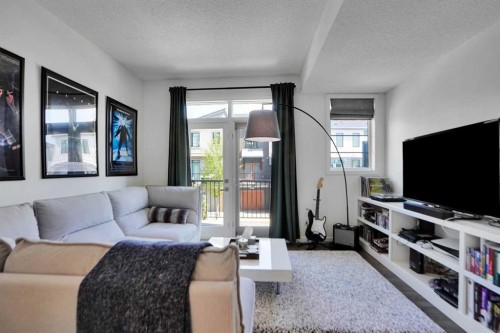 281 Walden Drive Se, Calgary, AB - Indoor Photo Showing Living Room