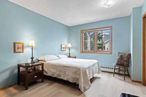 101-410 7 Street Sw, High River, AB - Indoor Photo Showing Bedroom