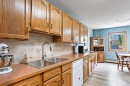 101-410 7 Street Sw, High River, AB  - Indoor Photo Showing Kitchen With Double Sink 