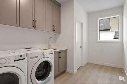 206 Monterey Bay Se, High River, AB - Indoor Photo Showing Laundry Room
