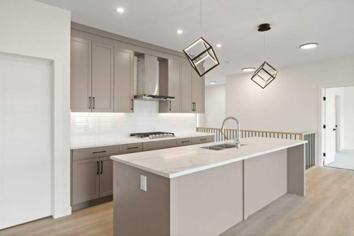 206 Monterey Bay Se, High River, AB - Indoor Photo Showing Kitchen With Double Sink With Upgraded Kitchen