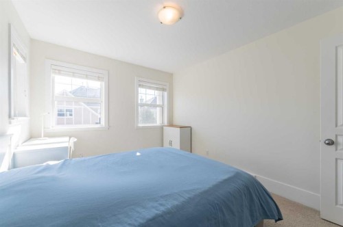 1024 Wentworth Rise Sw, Calgary, AB - Indoor Photo Showing Bedroom