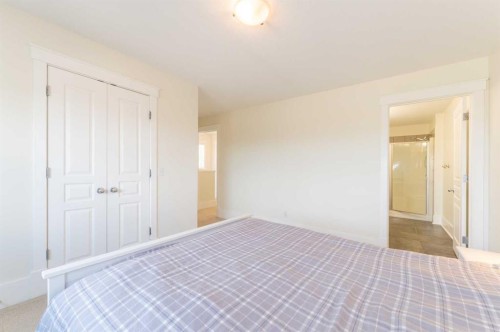1024 Wentworth Rise Sw, Calgary, AB - Indoor Photo Showing Bedroom