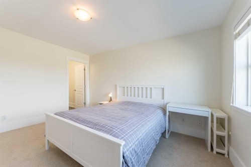 1024 Wentworth Rise Sw, Calgary, AB - Indoor Photo Showing Bedroom