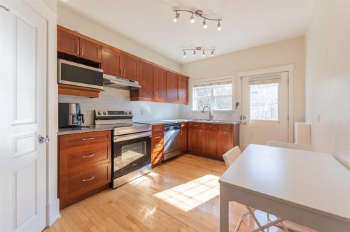 1024 Wentworth Rise Sw, Calgary, AB - Indoor Photo Showing Kitchen With Double Sink