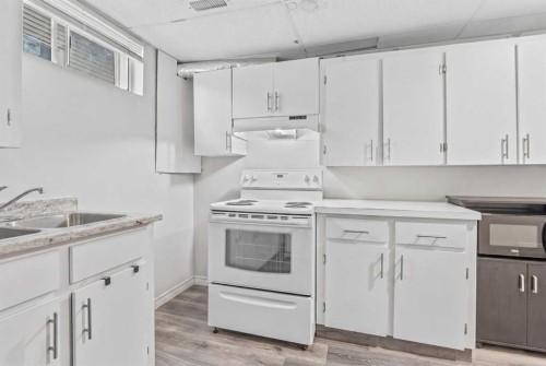 84 Falconridge Place Ne, Calgary, AB - Indoor Photo Showing Kitchen