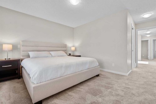 567 Evansborough Way Nw, Calgary, AB - Indoor Photo Showing Bedroom
