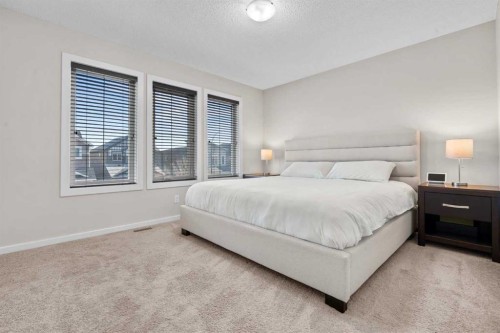 567 Evansborough Way Nw, Calgary, AB - Indoor Photo Showing Bedroom