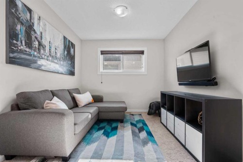 567 Evansborough Way Nw, Calgary, AB - Indoor Photo Showing Living Room