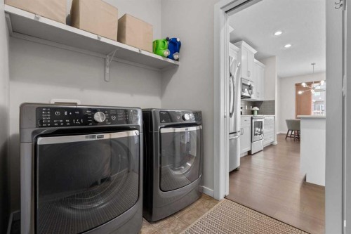 567 Evansborough Way Nw, Calgary, AB - Indoor Photo Showing Laundry Room