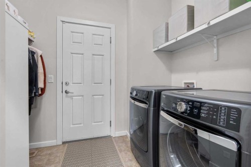 567 Evansborough Way Nw, Calgary, AB - Indoor Photo Showing Laundry Room