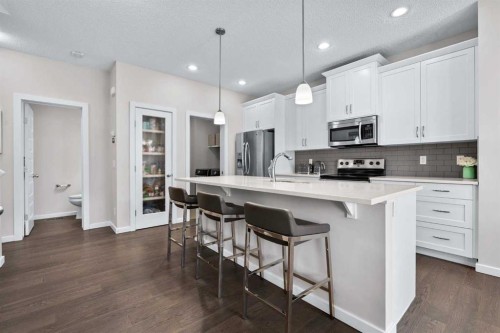 567 Evansborough Way Nw, Calgary, AB - Indoor Photo Showing Kitchen With Stainless Steel Kitchen With Upgraded Kitchen