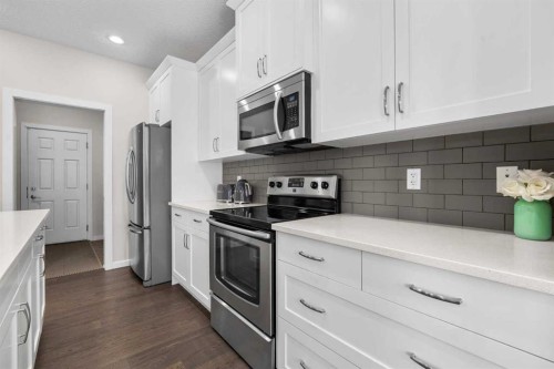 567 Evansborough Way Nw, Calgary, AB - Indoor Photo Showing Kitchen With Stainless Steel Kitchen With Upgraded Kitchen