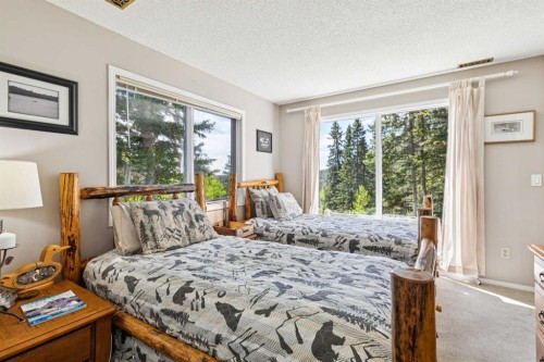 36 Cummer Place, Bragg Creek, AB - Indoor Photo Showing Bedroom