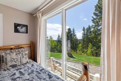 36 Cummer Place, Bragg Creek, AB - Indoor Photo Showing Bedroom