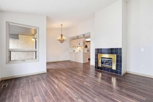 29 Edenwold Green Nw, Calgary, AB - Indoor Photo Showing Living Room With Fireplace