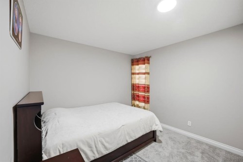 591 Taralake Way Ne, Calgary, AB - Indoor Photo Showing Bedroom