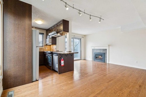 10-123 13 Avenue Ne, Calgary, AB - Indoor With Fireplace