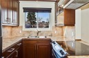 10-123 13 Avenue Ne, Calgary, AB  - Indoor Photo Showing Kitchen With Double Sink 