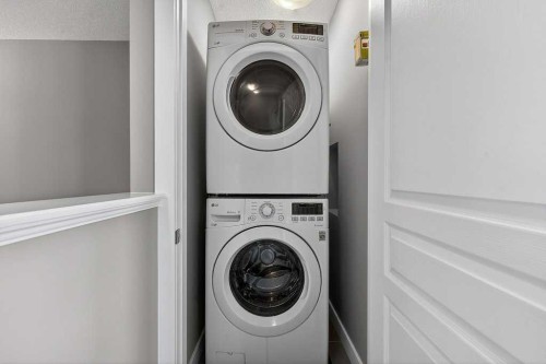 271 Fireside Drive, Cochrane, AB - Indoor Photo Showing Laundry Room