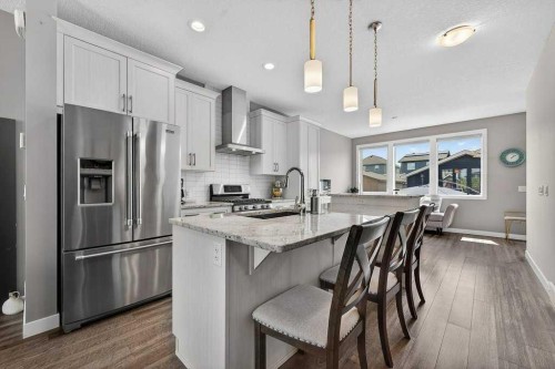 271 Fireside Drive, Cochrane, AB - Indoor Photo Showing Kitchen With Stainless Steel Kitchen With Upgraded Kitchen